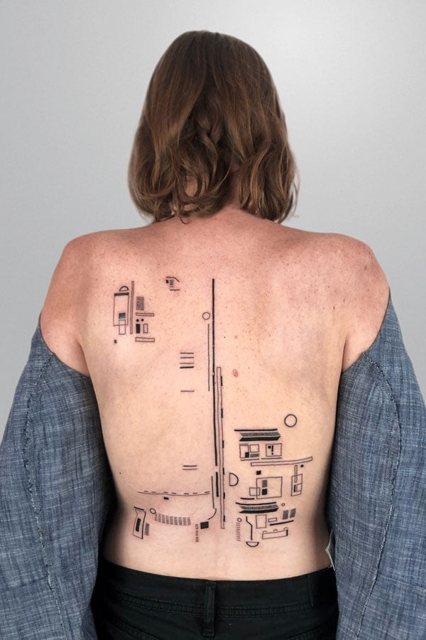 abstract contemporary tattoo on the back