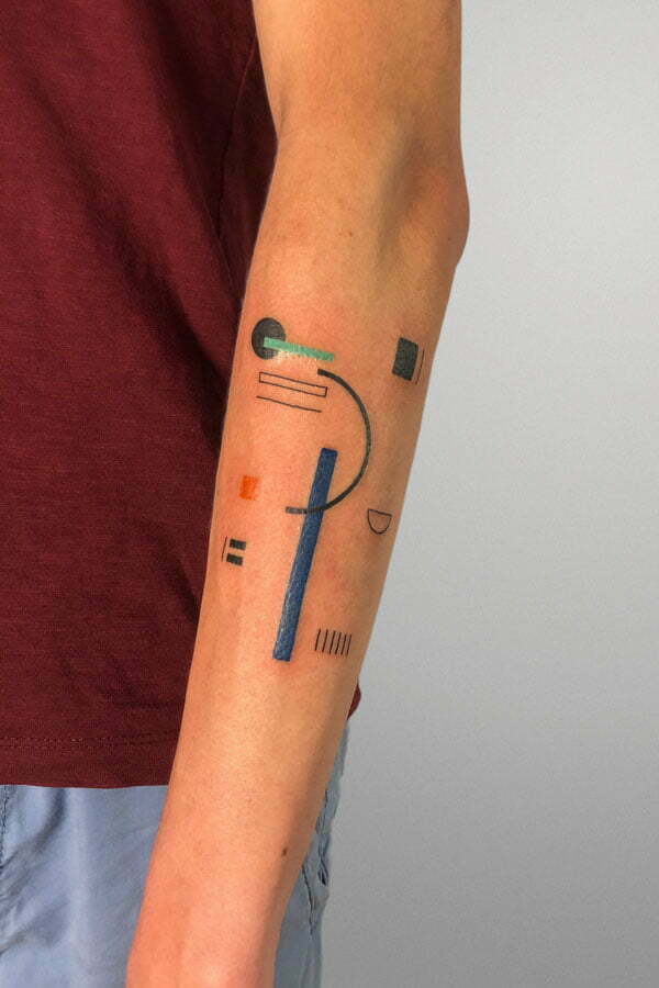 small flash tattoo with geometric forms and colors